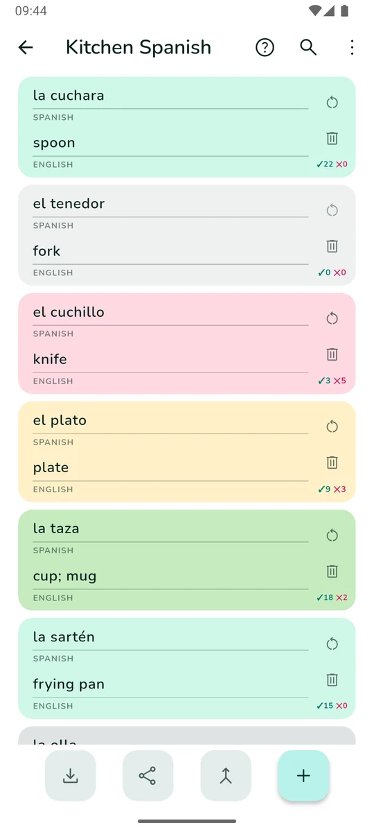 The card editor for a Spanish set: each card is a box tinted by how well it is known, from grey for unseen through magenta and yellow to mint, with per-card right and wrong tallies.